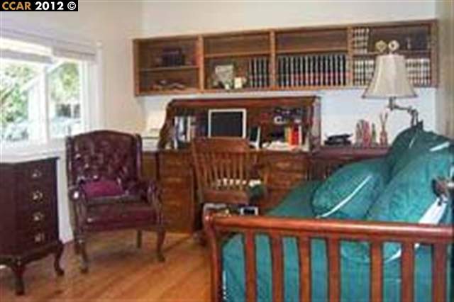 55 Gate Road Walnut Creek, CA 94598 - Photo 12 of 22 a view of a chair and tables in the balcony