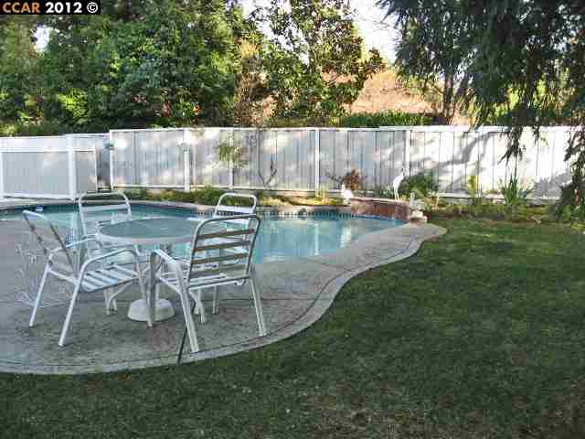55 Gate Road Walnut Creek, CA 94598 - Photo 17 of 22 a view of swimming pool with outdoor seating and yard