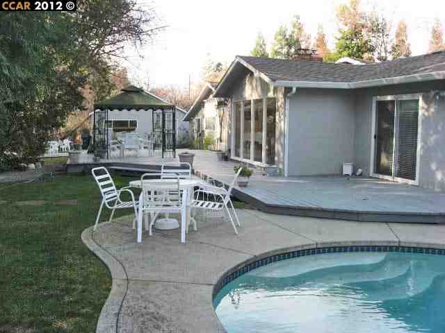 55 Gate Road Walnut Creek, CA 94598 - Photo 19 of 22 a view of a house with backyard porch and sitting area
