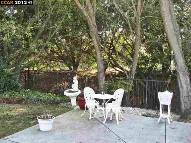 55 Gate Road Walnut Creek, CA 94598 - Photo 22 of 22 a view of a chairs and table in the patio