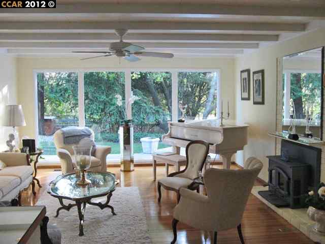 55 Gate Road Walnut Creek, CA 94598 - Photo 5 of 22 a living room with furniture and a window