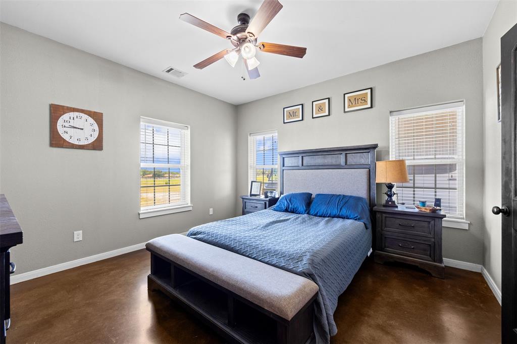 511 East Pecan Tree Road Waxahachie, TX 75165 - Photo 17 of 36 Primary bedroom located on opposite side of the home for added privacy.