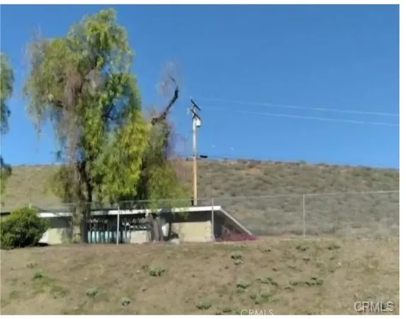 a view of a balcony with chairs