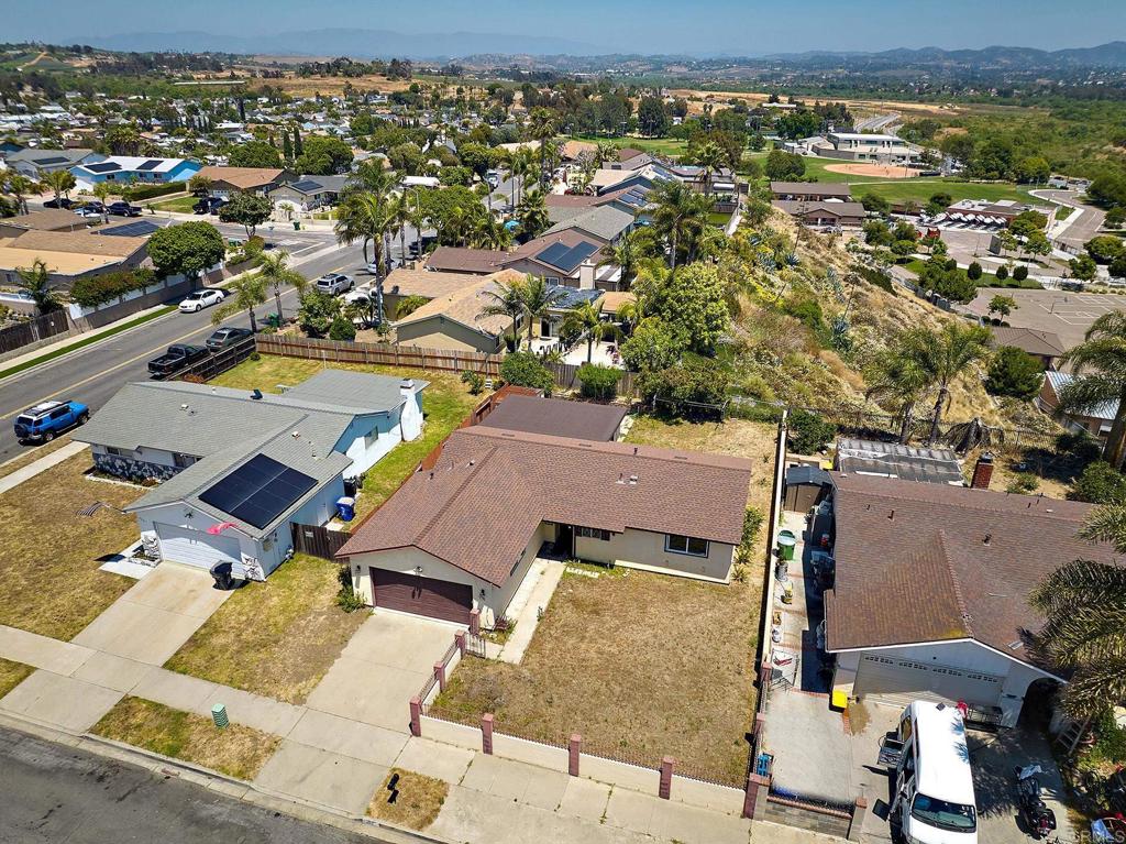 588 Charles Drive Oceanside, CA 92057 - Photo 2 of 17 an aerial view of residential houses with outdoor space