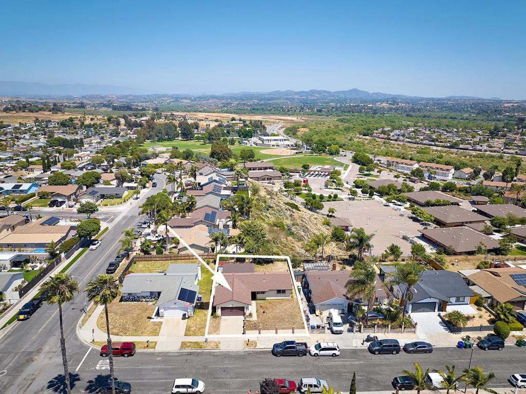 588 Charles Drive Oceanside, CA 92057 - Photo 6 of 17 an aerial view of a city