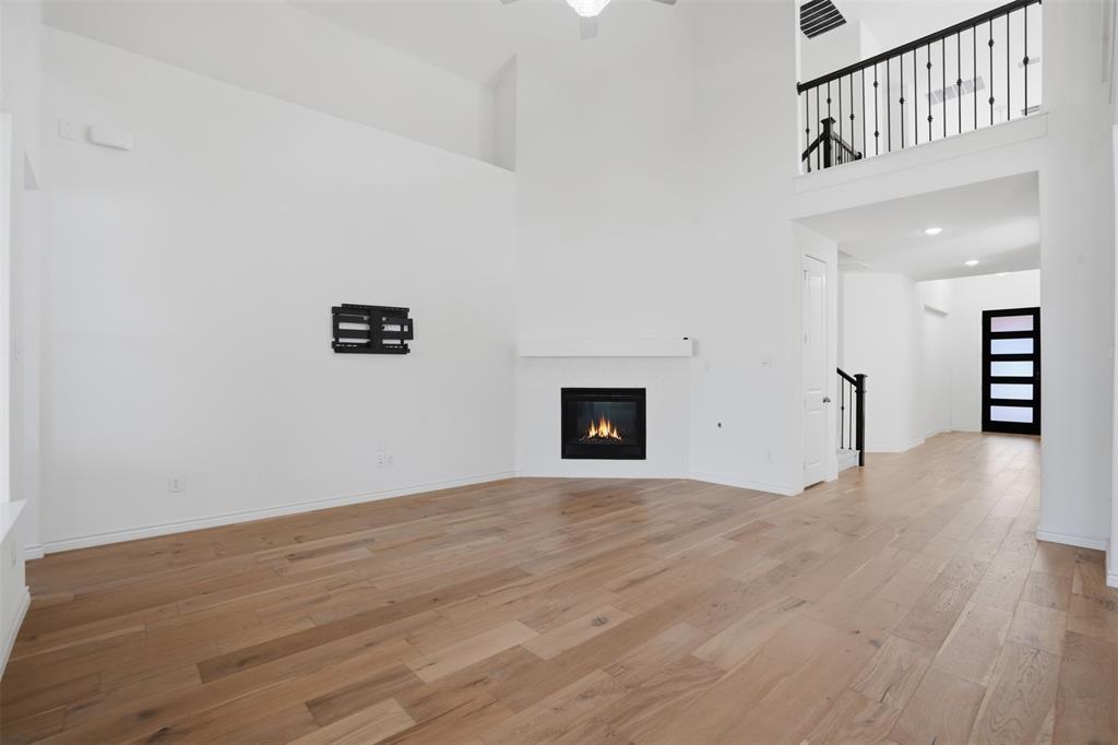 537 Oakmoss Street Little Elm, TX 76227 - Photo 10 of 39 a view of an empty room with a window