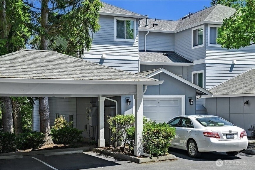 8515 244th Street Southwest, Unit A2 Edmonds, WA 98026 - Photo 1 of 22 a view of a car parked in front of a house
