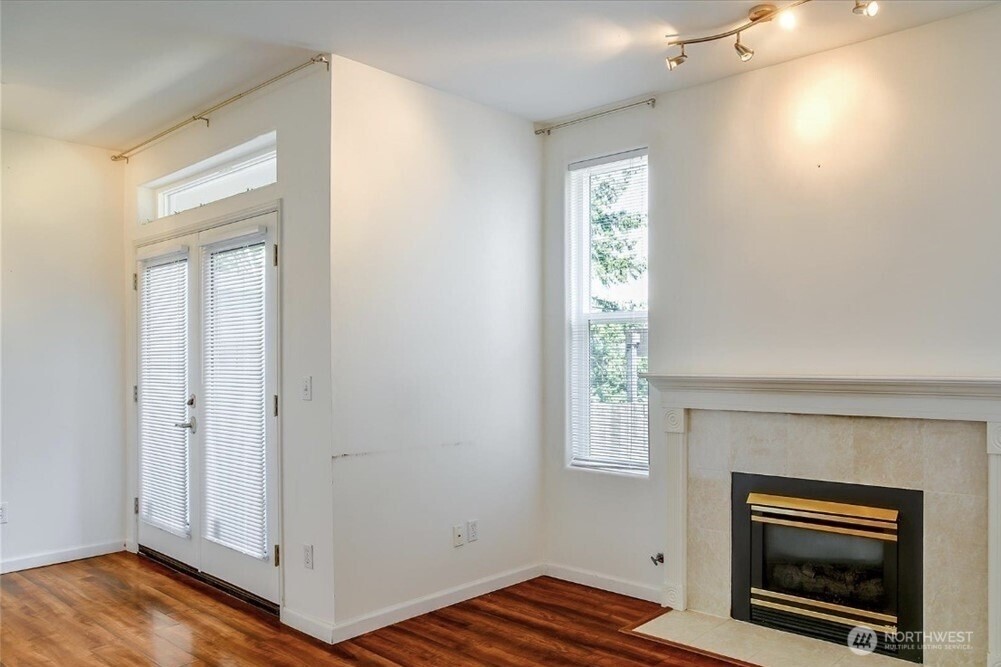 8515 244th Street Southwest, Unit A2 Edmonds, WA 98026 - Photo 17 of 22 a living room with a fireplace