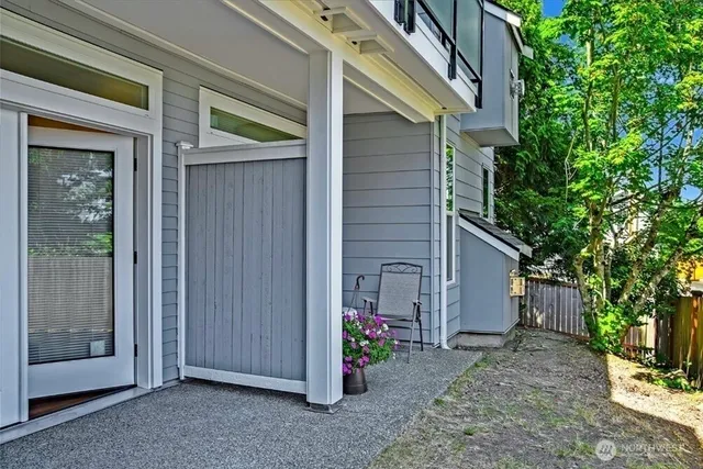 a view of backyard with potted plants