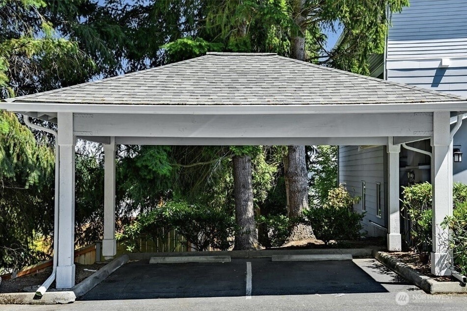8515 244th Street Southwest, Unit A2 Edmonds, WA 98026 - Photo 21 of 22 a view of backyard with potted plants