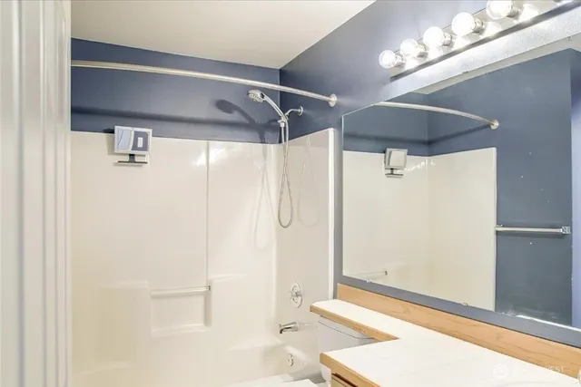 a view of kitchen with furniture and wooden floor