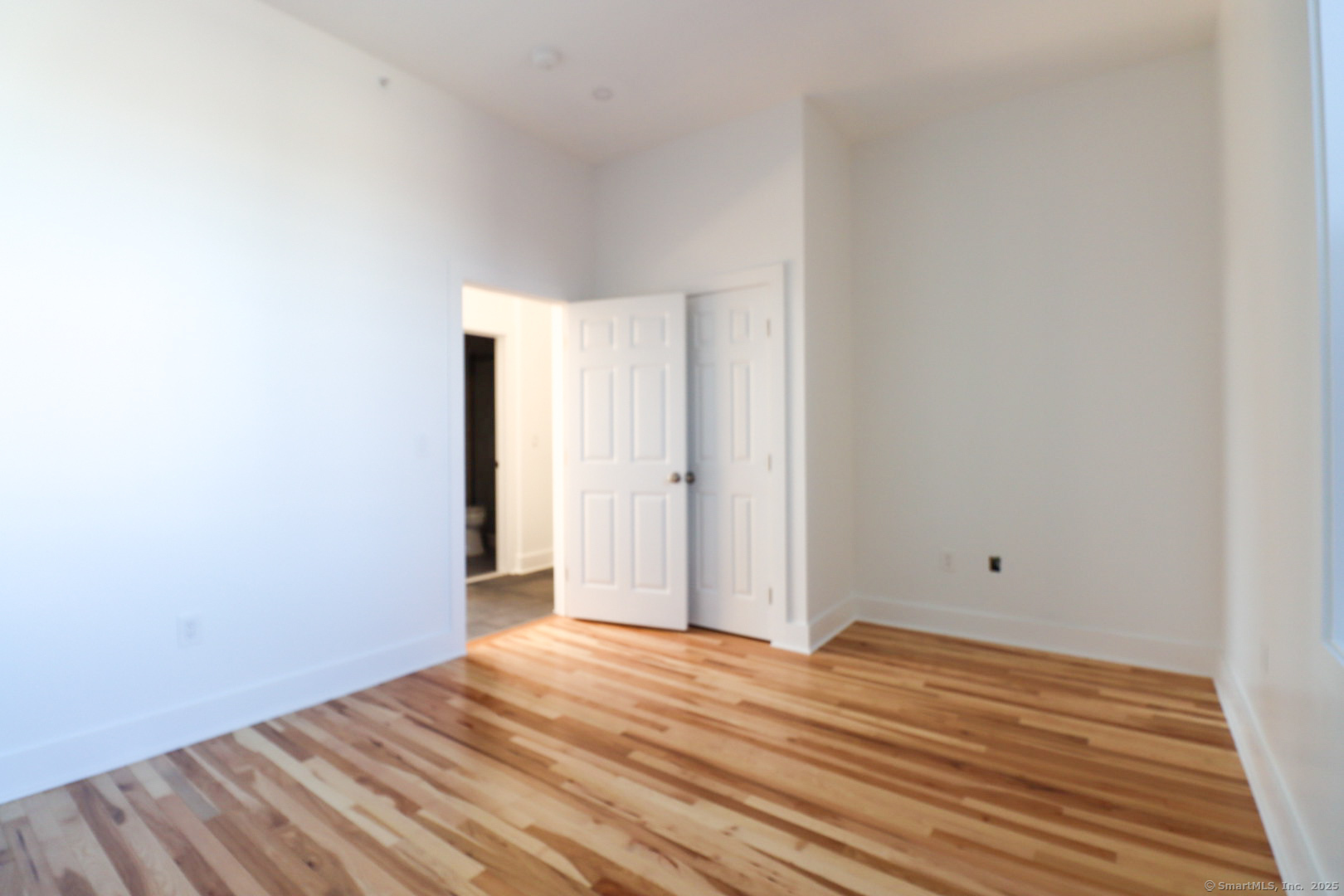 253 State Street, Unit 3R New London, CT 06320 - Photo 6 of 7 a view of empty room with wooden floor