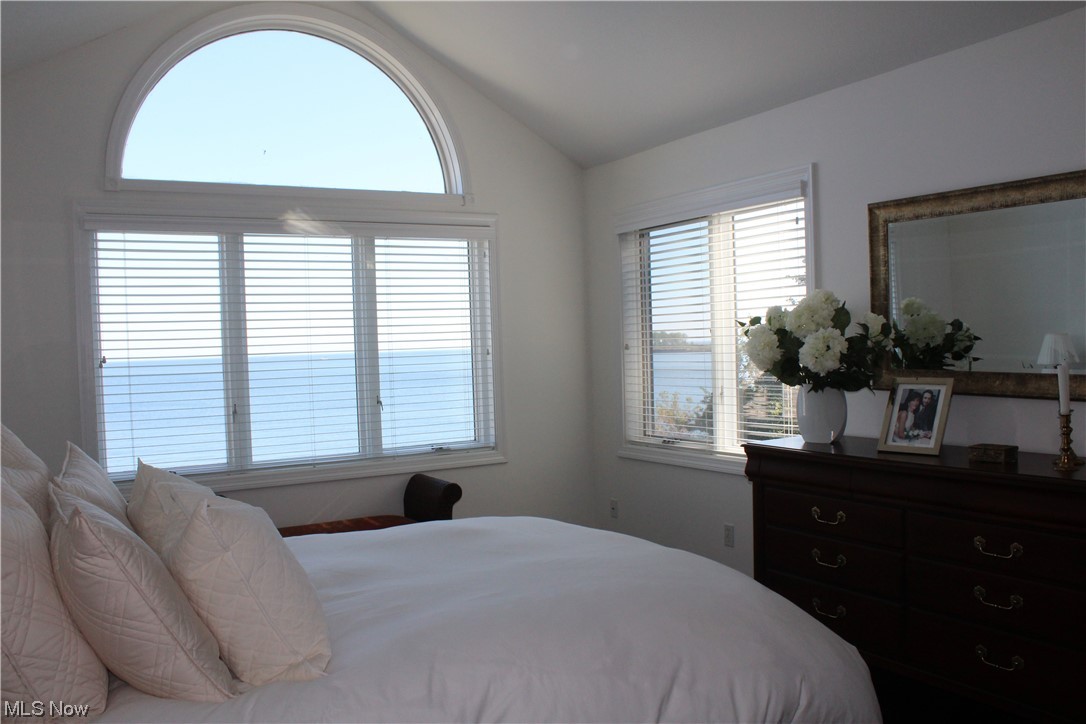 122 Turtle Bay Huron, OH 44839 - Photo 20 of 31 Bedroom with multiple windows and vaulted ceiling