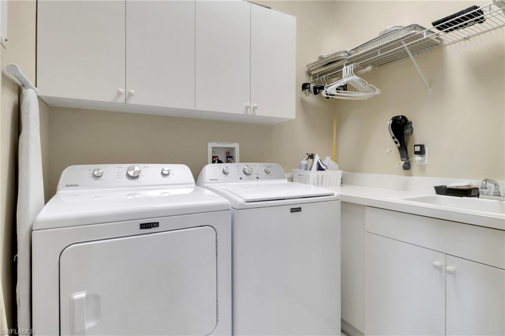3620 Lansing Loop, Unit 202 Estero, FL 33928 - Photo 27 of 40 a utility room with dryer and washer