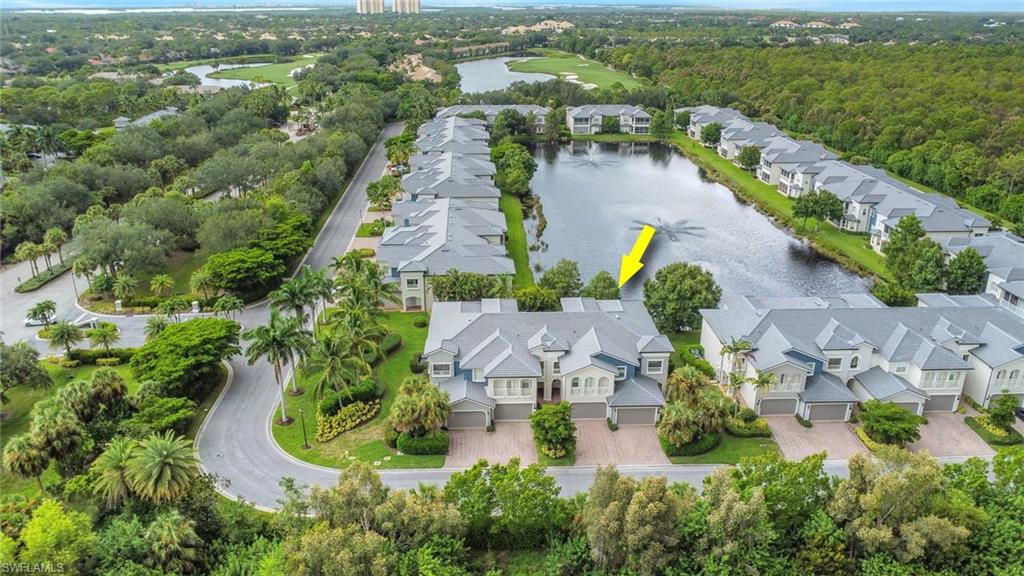 3620 Lansing Loop, Unit 202 Estero, FL 33928 - Photo 28 of 40 an aerial view of residential houses with outdoor space and river