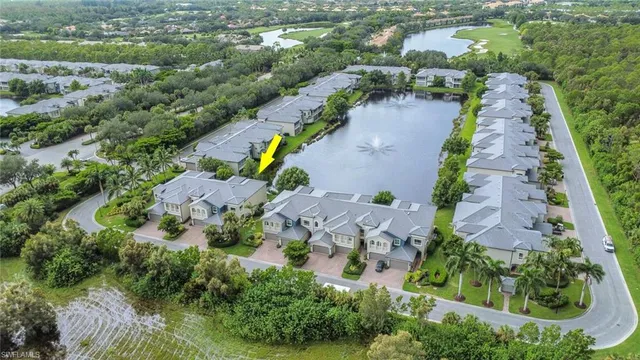 an aerial view of a house with a garden