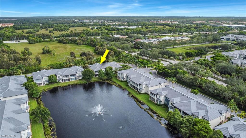 3620 Lansing Loop, Unit 202 Estero, FL 33928 - Photo 32 of 40 an aerial view of a house with a garden