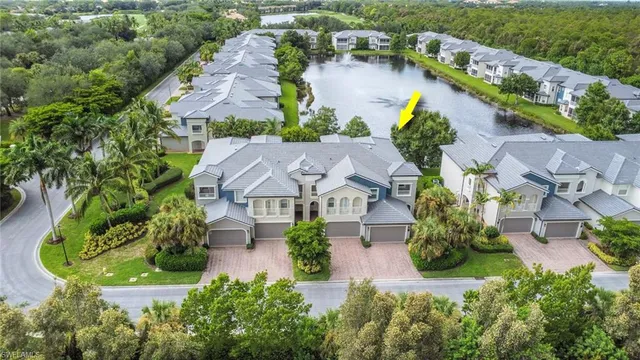 an aerial view of house with yard swimming pool and outdoor seating