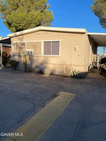 a view of a back yard of the house