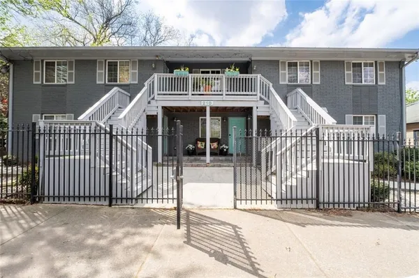 a front view of a house with a porch