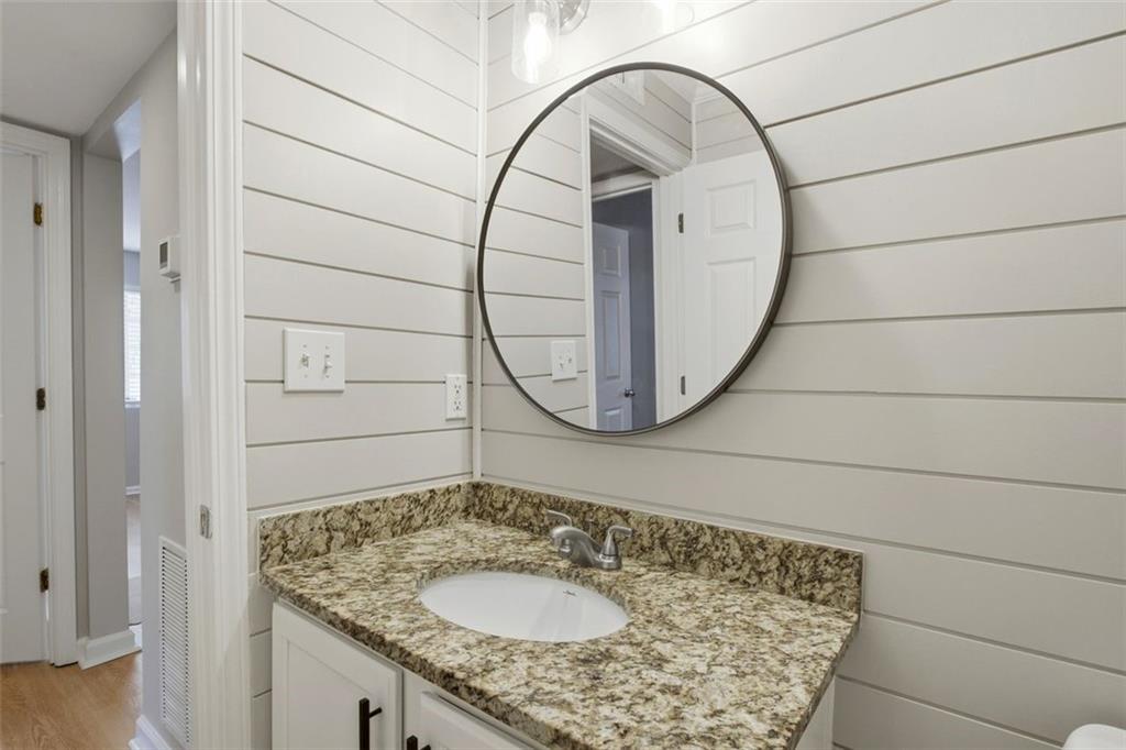 210 Sampson Street Northeast, Unit 5 Atlanta, GA 30312 - Photo 15 of 21 a bathroom with a sink and a mirror