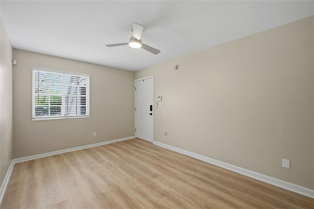 210 Sampson Street Northeast, Unit 5 Atlanta, GA 30312 - Photo 6 of 21 a view of an empty room with a window