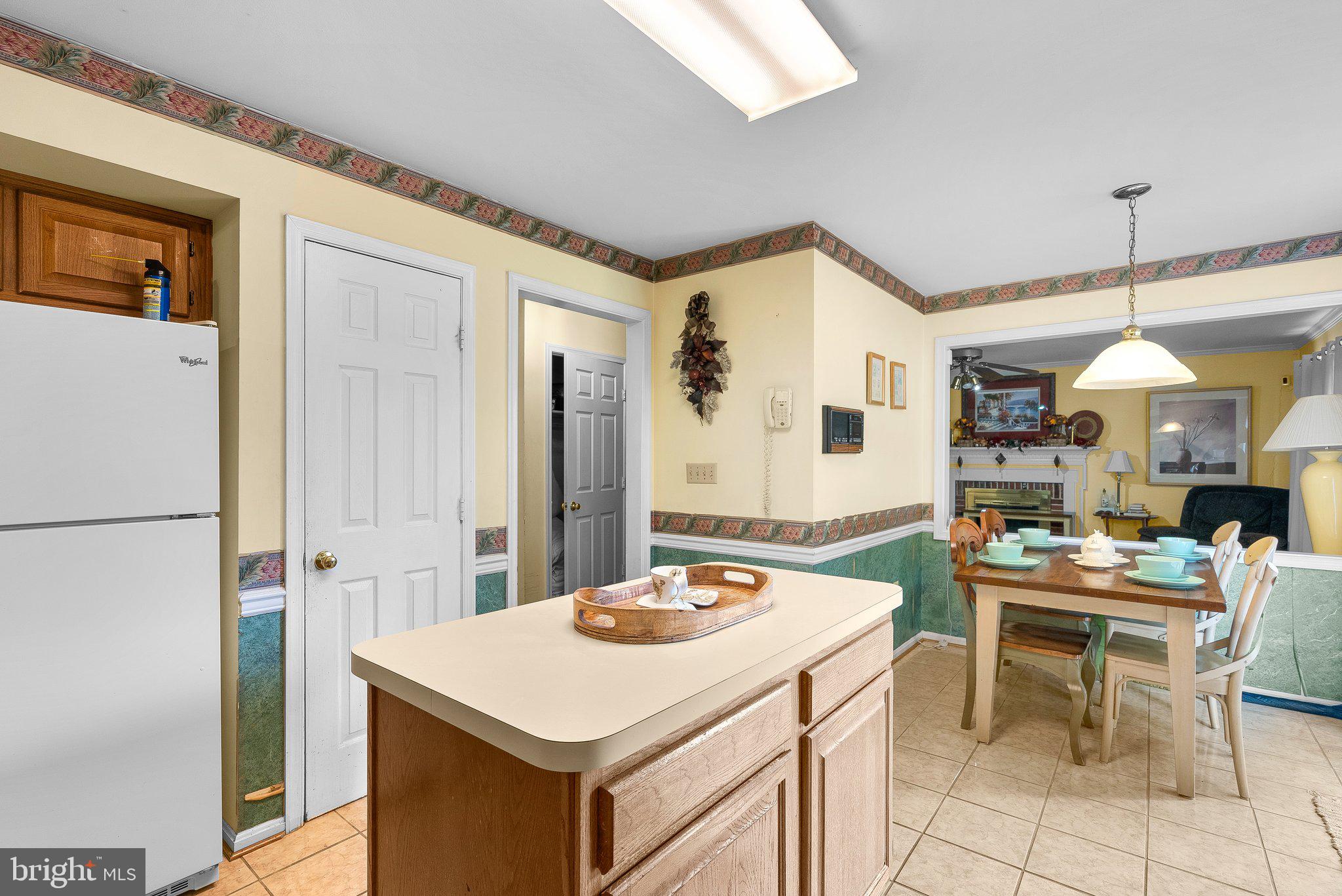 1400 Baytree Terrace Bowie, MD 20721 - Photo 11 of 39 a kitchen that has a table and chairs in it