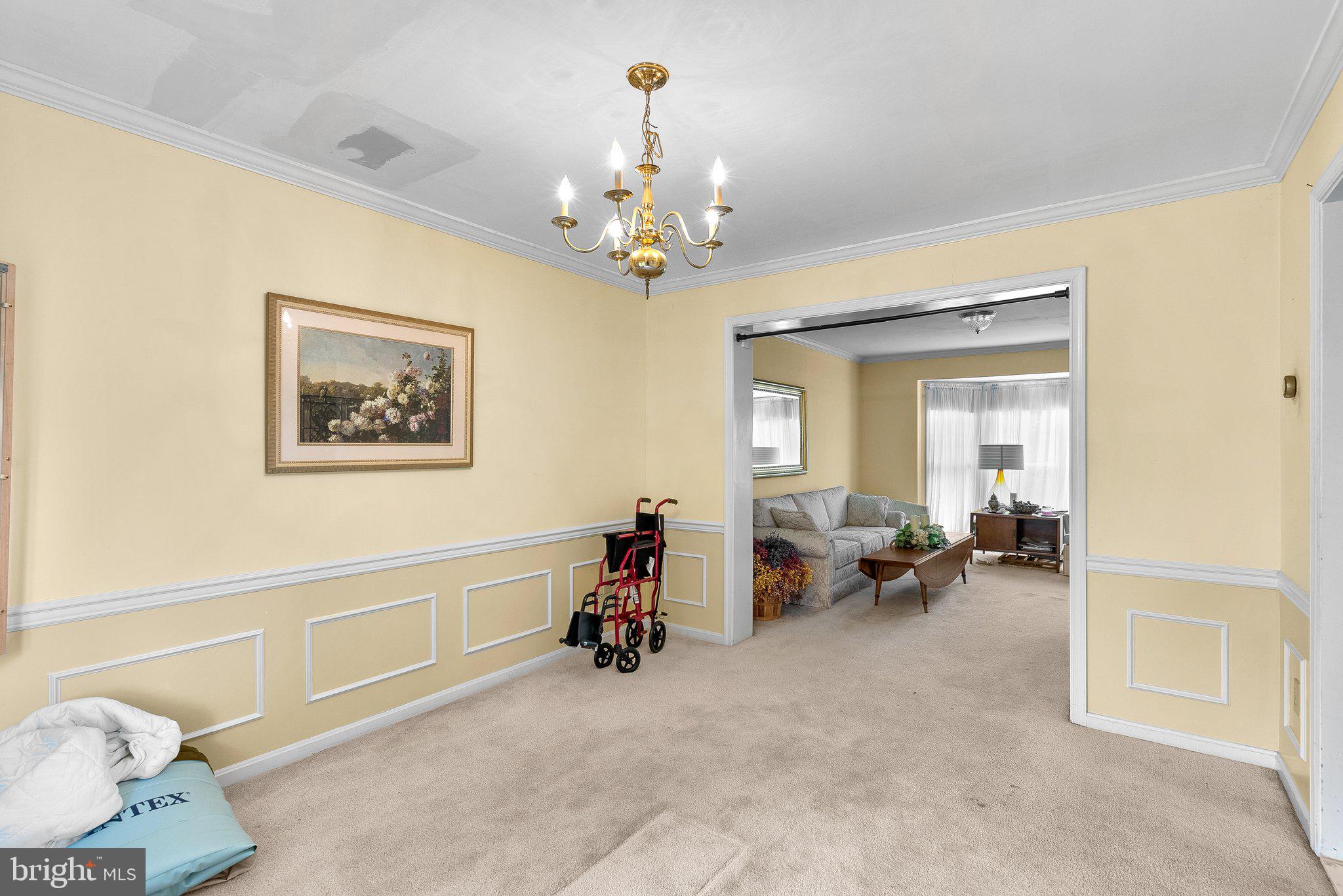 1400 Baytree Terrace Bowie, MD 20721 - Photo 15 of 39 a living room with furniture and a chandelier