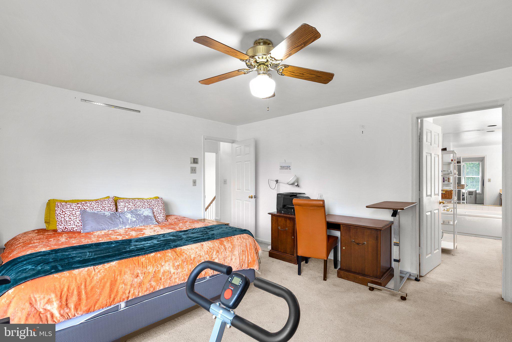 1400 Baytree Terrace Bowie, MD 20721 - Photo 18 of 39 a bedroom with bed and a chandelier