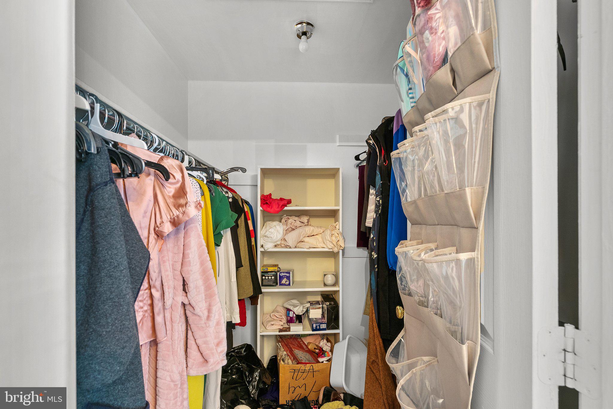 1400 Baytree Terrace Bowie, MD 20721 - Photo 20 of 39 a view of walk in closet with clothes and shoes