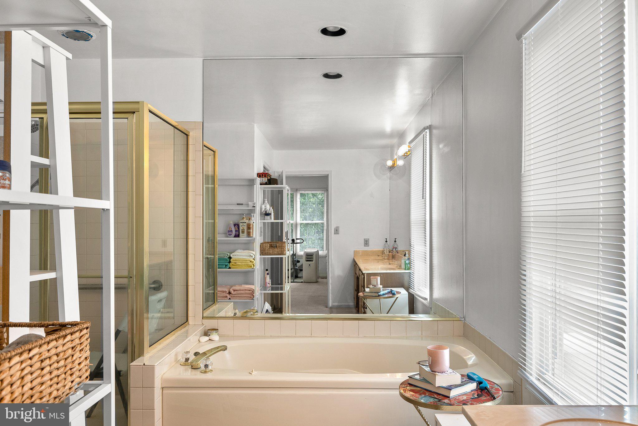 1400 Baytree Terrace Bowie, MD 20721 - Photo 21 of 39 a bathroom with a bathtub and a shower