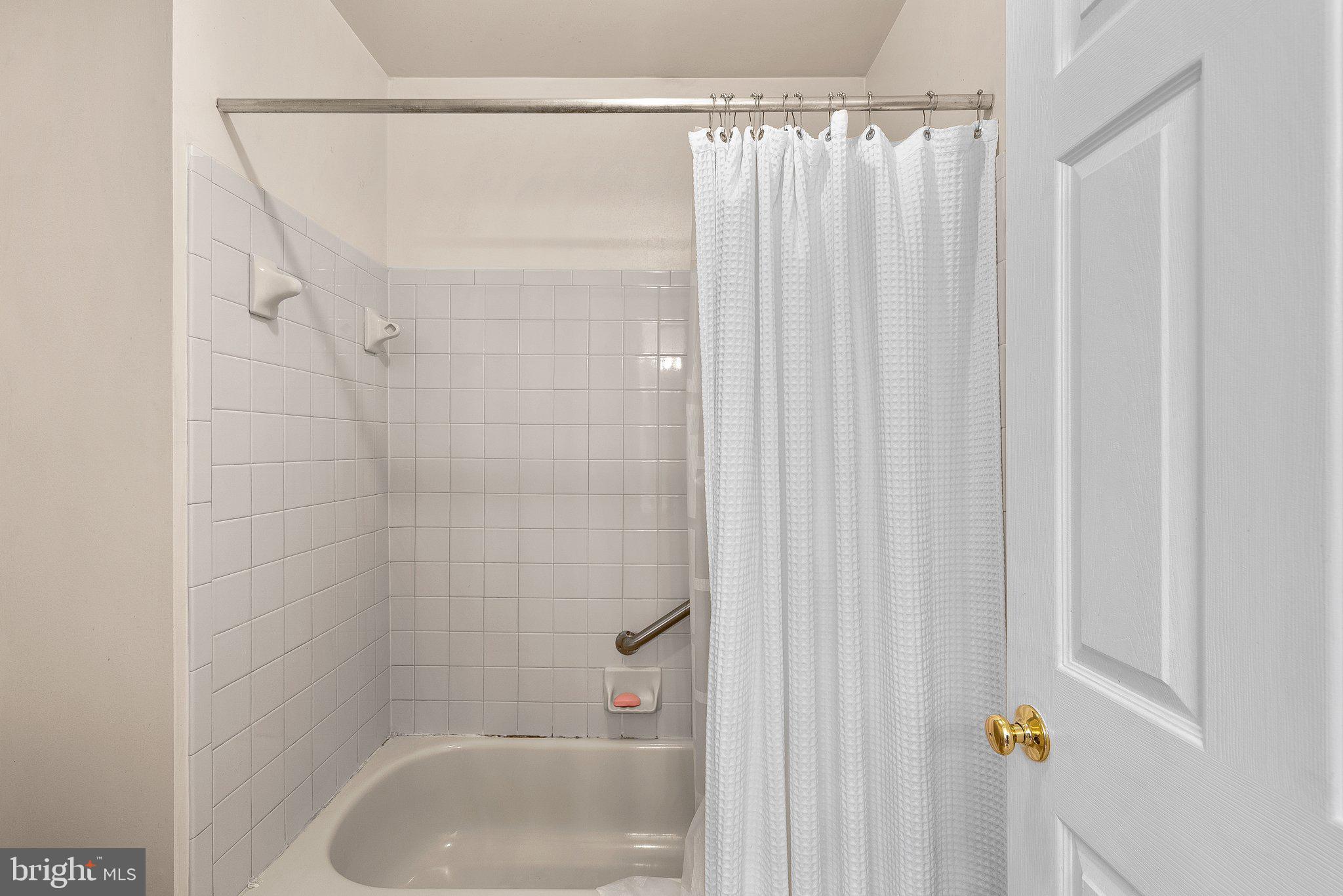 1400 Baytree Terrace Bowie, MD 20721 - Photo 30 of 39 a bathroom with a shower and a tub