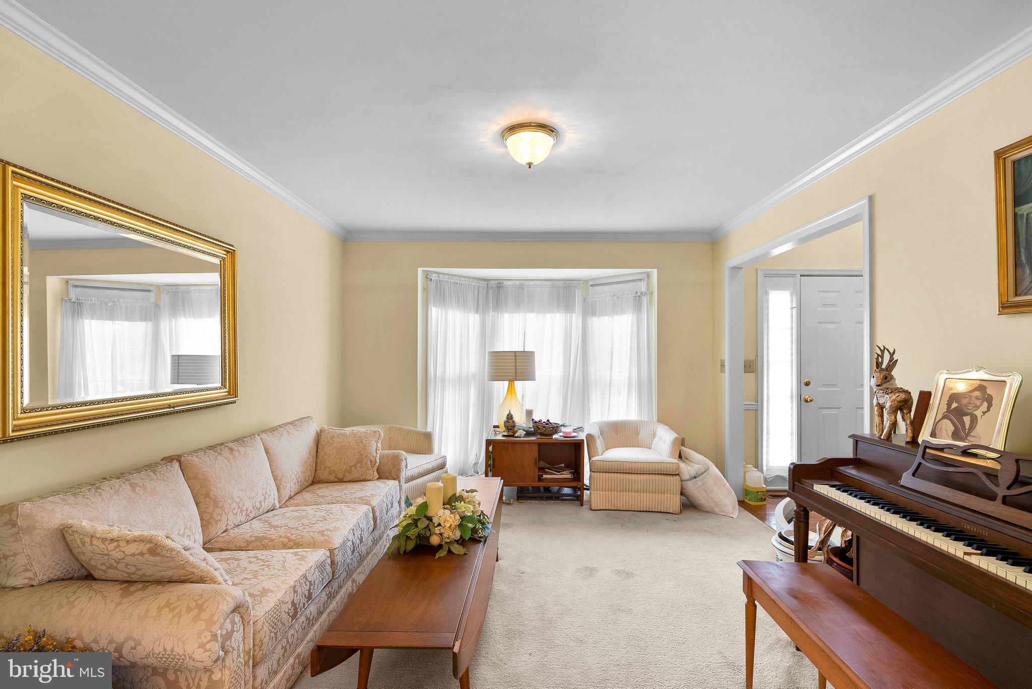 1400 Baytree Terrace Bowie, MD 20721 - Photo 32 of 39 a living room with a couch and a window