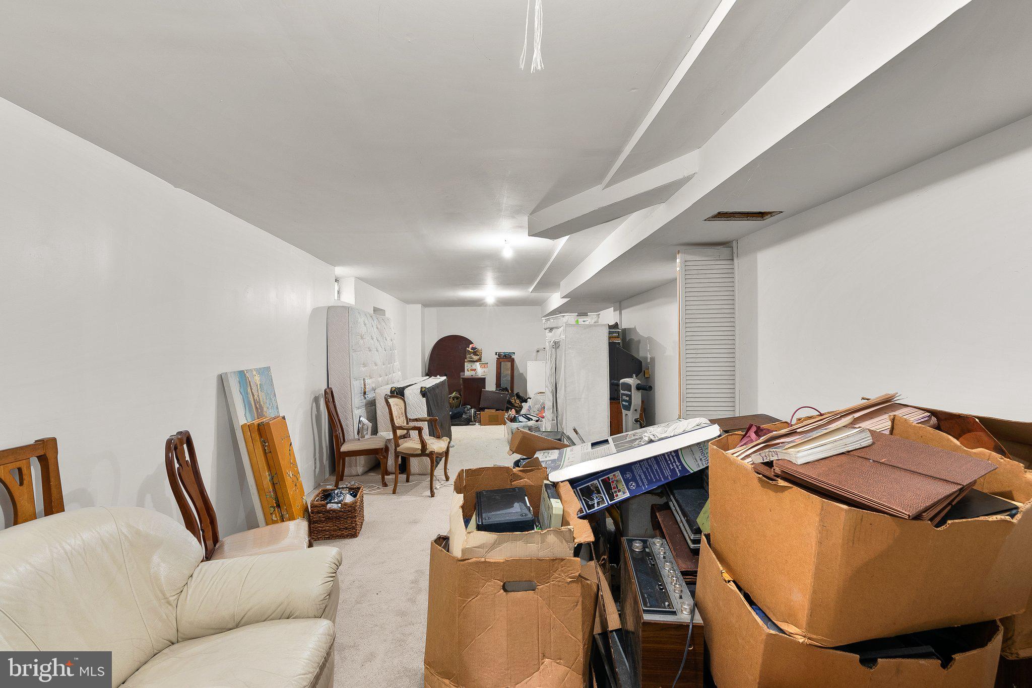 1400 Baytree Terrace Bowie, MD 20721 - Photo 33 of 39 a living room with furniture a flat screen tv and a window