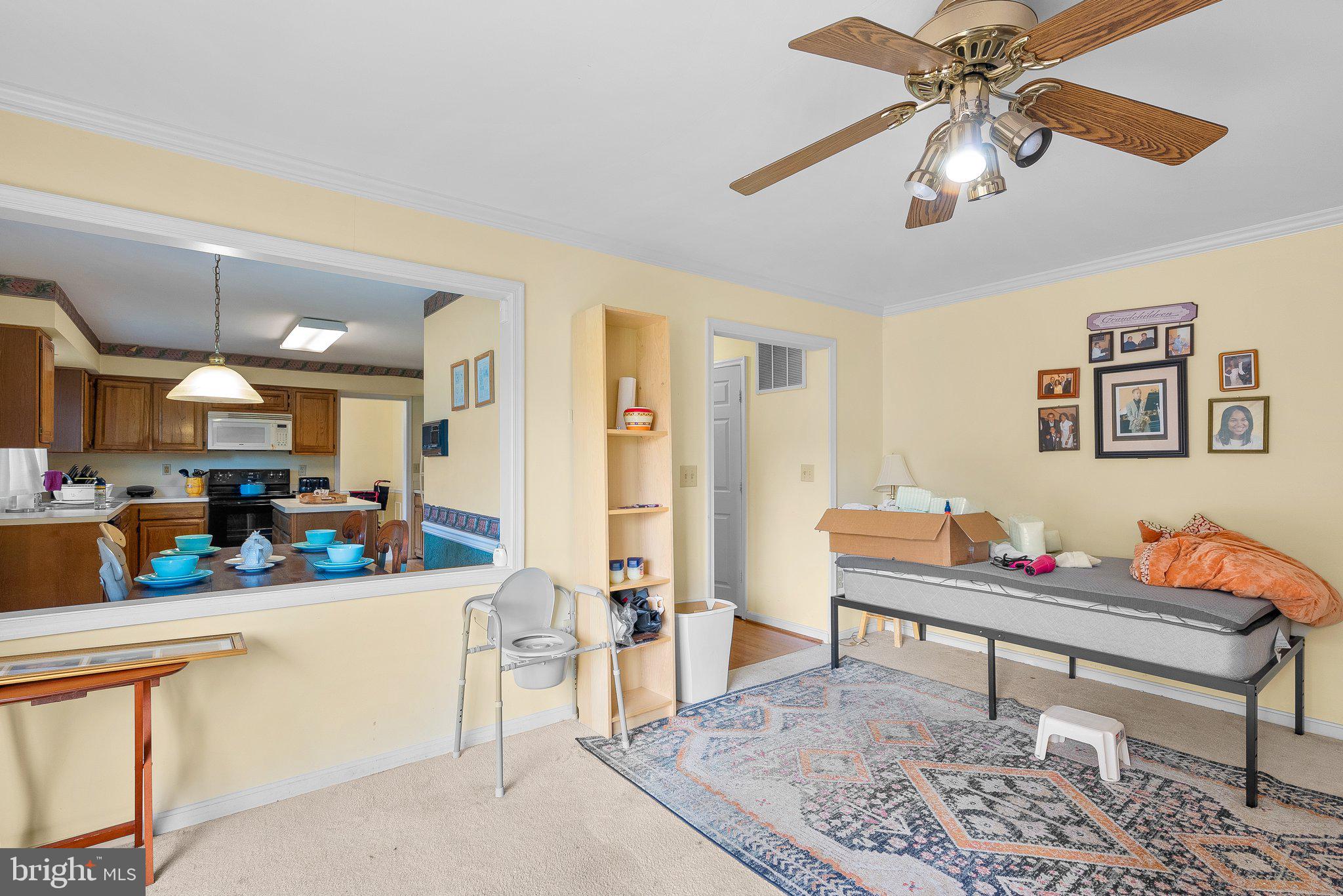 1400 Baytree Terrace Bowie, MD 20721 - Photo 34 of 39 a living room with dining room and lots of furniture