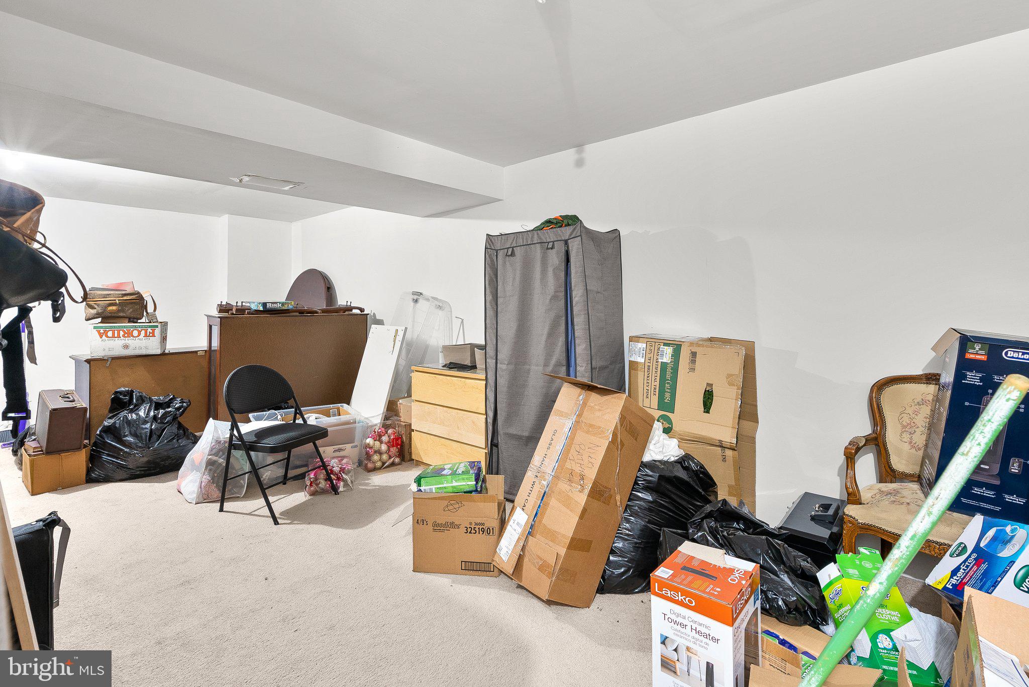 1400 Baytree Terrace Bowie, MD 20721 - Photo 36 of 39 a view of a workspace with furniture and a flat screen tv