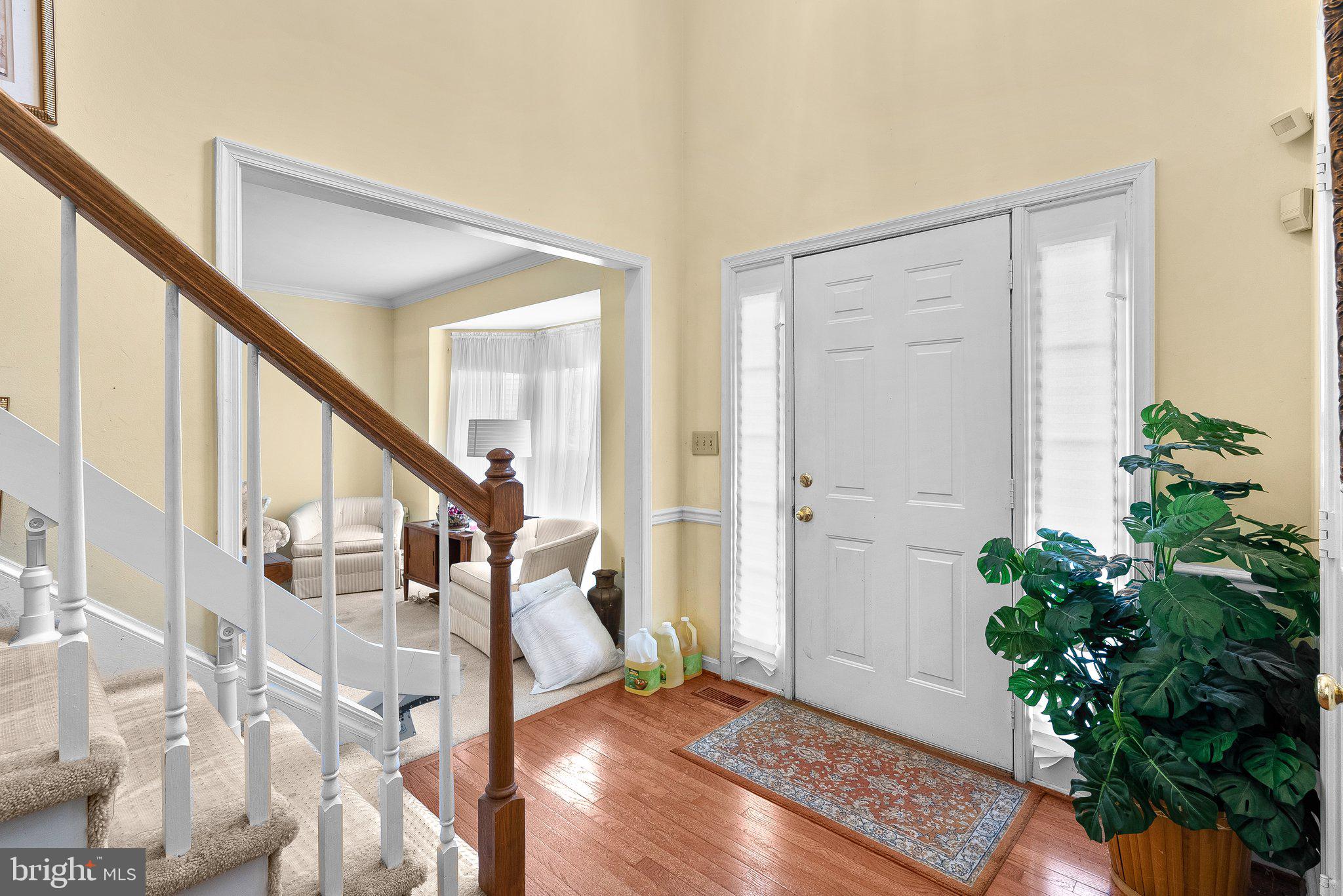 1400 Baytree Terrace Bowie, MD 20721 - Photo 6 of 39 a view of an entryway with wooden floor and front door