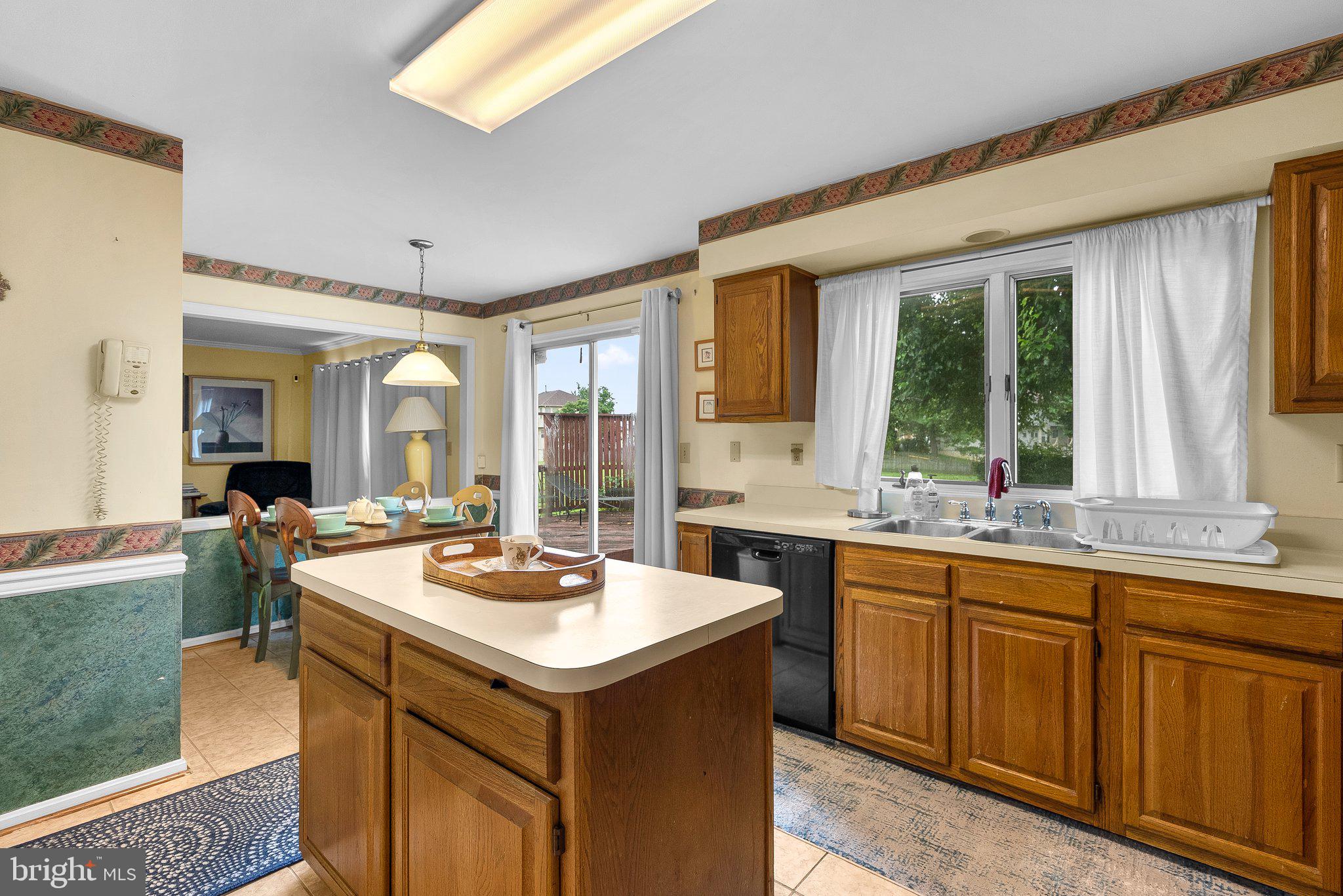 1400 Baytree Terrace Bowie, MD 20721 - Photo 10 of 39 a kitchen with a stove a sink and a refrigerator