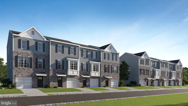 a view of a big house with a yard