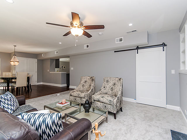 243 Longcommon Road Riverside, IL 60546 - Photo 11 of 25 a living room with furniture and kitchen view