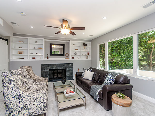 243 Longcommon Road Riverside, IL 60546 - Photo 13 of 25 a living room with furniture and a fireplace