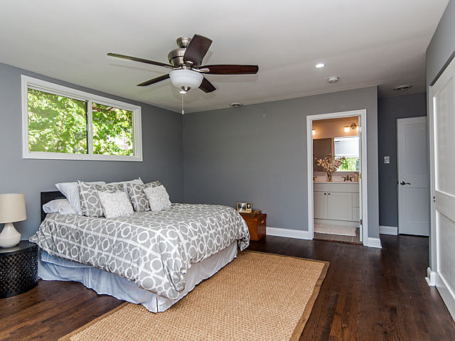 243 Longcommon Road Riverside, IL 60546 - Photo 15 of 25 a bedroom with a bed and a large window
