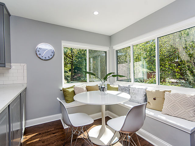 243 Longcommon Road Riverside, IL 60546 - Photo 7 of 25 a dining room with furniture a rug and a large window
