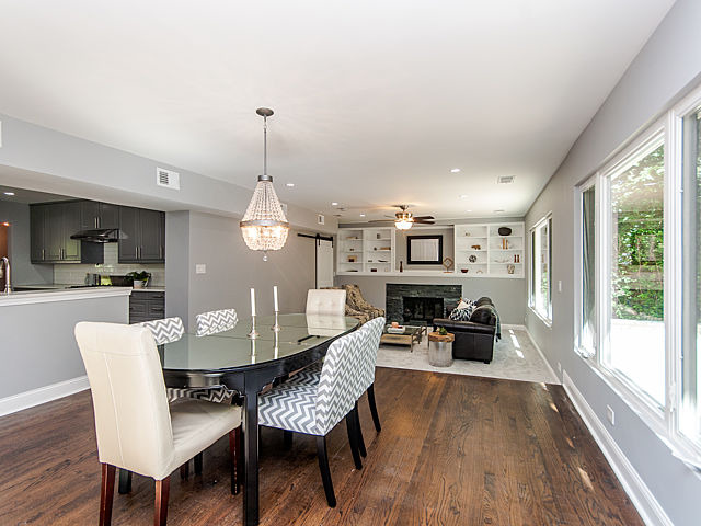 243 Longcommon Road Riverside, IL 60546 - Photo 10 of 25 a view of a dining room with furniture window and wooden floor