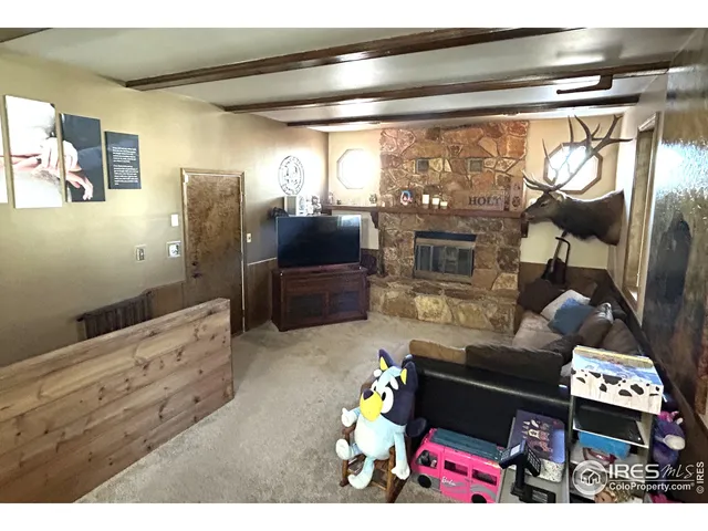 a living room with a couch and a table