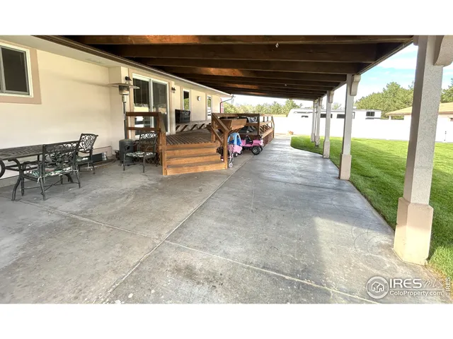 a view of a field with an ocean