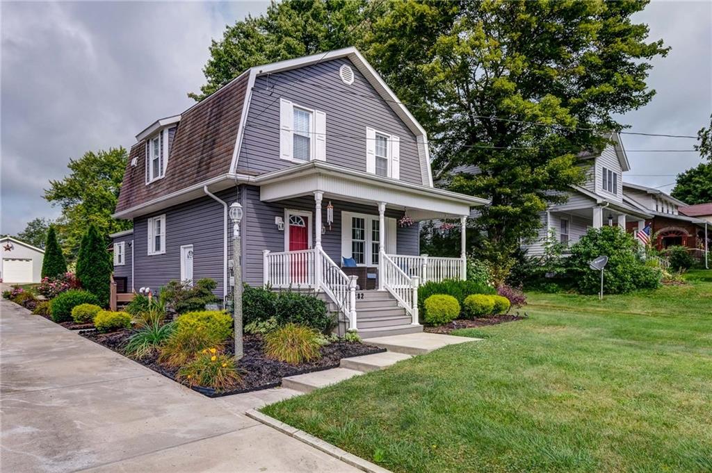 282 Meridian Road Butler, PA 16001 - Photo 22 of 25 a front view of a house with garden and porch