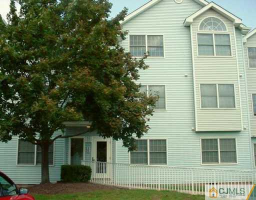 613 Edpas Road New Brunswick, NJ 08901 - Photo 1 of 7 a front view of a house with a garden