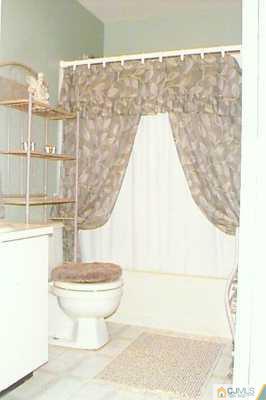 613 Edpas Road New Brunswick, NJ 08901 - Photo 7 of 7 a bathroom with a toilet and a shower
