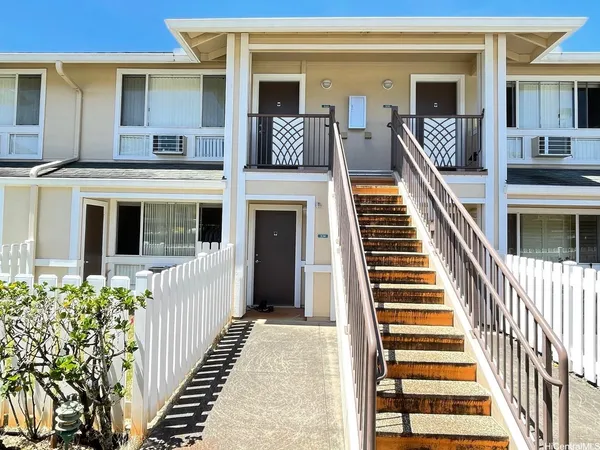 front view of a house with a balcony